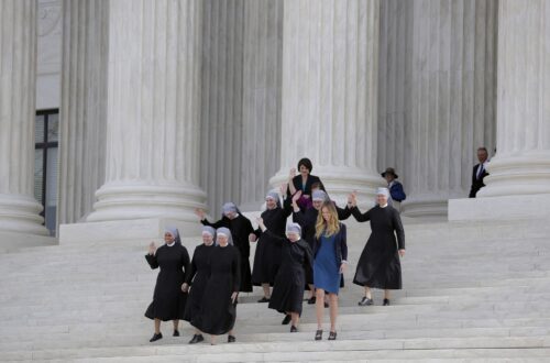 The Little Sisters of the Poor descend the steps of the U.S. Supreme Court.