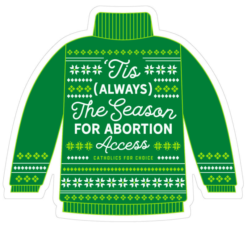 A Green Christmas Sweater that says 